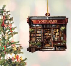 a christmas ornament hanging from the side of a tree with bookshelves