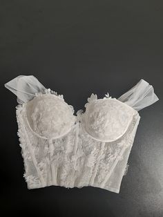 "Bridal Bustier Lace Top This corset is made to order and is available in multiple bra cup sizes from 30A to 40DD Please include your cup size in \"personalization\" area before checking out. Any custom piece is more than welcome, please message me with your requirements. My shop ink: www.ateliertami.etsy.com Thank you for visiting!" Luxury Wedding Bra, Luxury Feminine Wedding Bra, Luxury Wedding Tops, Luxury Feminine Corset With Boned Bodice, Luxury White Bustier Top, Luxury Cream Elegant Corset, Luxury Feminine Corset For Party, Luxury Wedding Intimates With Padded Cups, Luxury Cream Corset