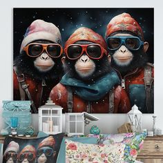 three chimpi wearing sunglasses and scarf in front of a wall with a painting on it