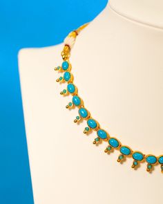 Ships free from New Canaan, CT. We accept returns and exchanges within 30 days of receiving your order. Please do not hesitate to call if you have any questions: 203-594-9105 Drawing on Hellenistic designs from Ancient Greece, our Cora Turquoise Blue String Necklace evokes the glistening gold of the sun and turquoise blue waters in Crete. A quiet statement piece. • Gold plated• Turquoise colored glass• Slide tie closure, as shown• Height: 0.375"• 0.4oz• Zinc free• Made in India SHOP ALL JEWELRY Fusion Style Blue Necklace For Festive Occasions, Blue Gemstone Accents Necklace, Bohemian Blue Jewelry With Gemstone Accents, Handmade Luxury Turquoise Jewelry, Blue Fusion Style Jewelry With Gemstone Accents, Luxury Handmade Turquoise Jewelry, Blue Fusion Jewelry With Gemstone Accents, Traditional Blue Oval Necklace, Blue Temple Jewelry With Round Shape