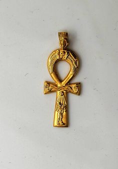 "Ancient Egypt Ankh pendant Key of life. key of life \"Ankh\"  Height: 3.8 cm. 1.5\" Width: 1.2 cm. 1/2\" Weight: 2.40 grams Please send me your phone number, I can't ship without it. Remote areas require additional payment for shipping." Cheap Ankh Necklace As Gift, Ankh Pendant, Luxury Symbolic Ankh Necklaces, Hallmarked Yellow Gold Ankh Necklace, Gold Ankh Amulet Jewelry, Gold Ankh Necklace Hallmarked, Egyptian Ankh Necklace, Teapot Necklace, Egypt Jewelry