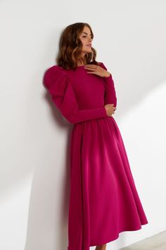 Gracious Pink Puffy Sleeves Evening Dress The Gracious Pink Puffy Sleeves Evening Dress With its boat neckline and fitted back, this dress is designed to provide both style and comfort. The ribbed puffy long sleeves are lined with softness, adding a luxurious touch to its overall designer look. Elegant Pink Puff Sleeve Dress With Pleated Sleeves, Pink Puff Sleeve Midi Dress For Fall, Pink Bishop Sleeve Puff Dress For Party, Evening Long Sleeve Midi Dress With Elastic Sleeves, Fall Evening Midi Dress With Blouson Sleeves, Pink Fitted Midi Dress With Balloon Sleeves, Fall Evening Puff Sleeve Dress With Bishop Sleeves, Evening Midi Dress With Blouson Sleeves For Fall, Elegant Voluminous Long Sleeve Dress