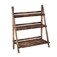 a wooden shelf with three shelves on it