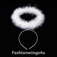 a white furry headband with the words fashionwings4u written below it