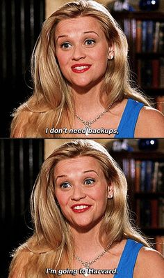 a woman with blonde hair and blue dress smiling at the camera while wearing a necklace that says i don't need backups