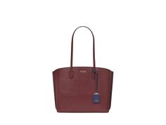 Kate Spade New York Suite Crossgrain Leather Work Tote - Tote Handbags : Cordovan Multi : Treat yourself to the Kate Spade New York Suite Crossgrain Leather Work Tote, a timeless piece that exudes elegance and practicality. Made from cow leather, this bag is a luxurious addition to your handbag collection. It features dual grab handles and a removable key clip, as well as two compartments with magnetic snap closure for easy access to your belongings. The interior zippered compartment keeps your essentials safe and secure. Interior slip pockets. Branding on the front. Polyester lining. Imported. Please note, the hardware color and interior lining may differ from the color shown in the photo. Saffiano Leather Tote Bag For Work, Classic Coated Canvas Bags For Work, Classic Coated Canvas Bags For Workwear, Saffiano Leather Bag With Removable Pouch For Work, Saffiano Leather Tote Bags For Shopping, Elegant Bag With Coated Canvas And Leather Lining, Saffiano Leather Bags With Leather Handles For Work, Saffiano Leather Work Bags With Leather Handles, Workwear Bag With Saffiano Leather And Leather Handles