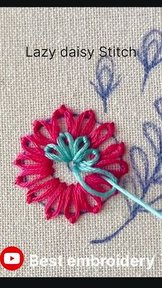 a close up of a flower on a piece of cloth with the words lazy daisy stitch