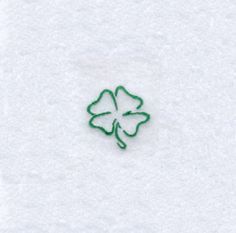 a four leaf clover is shown in the snow