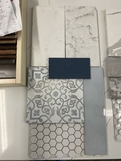 several different types of tile on display in a room