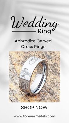 a wedding ring with the words, aphrodtic carved cross rings on it