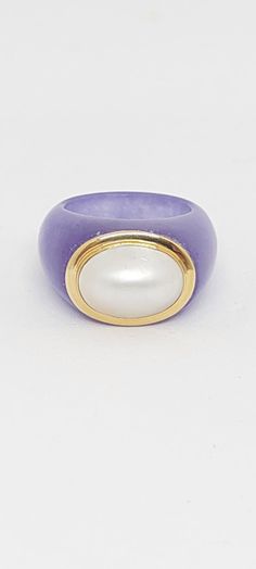 LAVENDER Jade Oval Pearl 14k Yellow Gold Ring. Jade/Pearl Ring. Purple Jade/Pearl Ring Size 7. Lavender Jade White Pearl LOVER. Genuine Jade Ring. Product Info: - Stones: Lavender Jade / White Pearl. - Stone Color: Purple and White - Oval Pearl measures: 8x11mm - Metal: 14K Yellow Gold. - Ring Size Available: 7  - Nice Gift Box Included Lavender Jade, Ring Purple, Purple Jade, Jade Ring, Yellow Gold Ring, Ring Size 7, White Pearl, Pearl Ring, Yellow Gold Rings