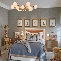 a bed room with a neatly made bed next to a stuffed animal on the floor