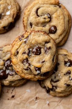 chocolate chip cookies are piled on top of each other