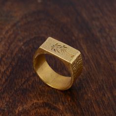 Engraved signet ring, Palm Tree Ring, Gold Signet Ring, Dainty Ring, Statement Ring, Tree signet ring, Hammered ring, Gold brass ring, Gifts Metal:- Brass ✦ Our rings are made of high-quality Brass metal and are carefully crafted by hand in our family workshop. The brass metal will develop a nice antique color over time. So, I suggest cleaning it once in a while for getting back to the shiny original color. You can use natural ingredients like lemon or vinegar with water to clean it. Also, apply a thin coat of transparent nail paint/nail enamel on the ring's inner side to save it from being tarnished. ❥ You may request to return the products, 15 days after you received the items (Delivery Day). The buyer is responsible for the shipping costs for the return. (We may have slower production a Tarnish Resistant Brass Signet Ring Gift, Brass Tarnish-resistant Signet Ring Gift, Engraved Brass Signet Ring As Gift, Handmade Gold Signet Ring For Promise, Etched Brass Rings For Gifts, Etched Brass Rings As Gifts, Palm Tree Jewelry, Engraved Signet Ring, Plant Rings