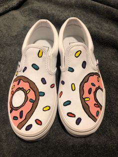 Hand painted donut vans. Size 3 in kids. Painted White Vans, Custom Kids Vans Shoes, Hand Painted Vans Slip On, Custom Vans Cactus, Disney Vans Painted, Shoe Inspo, Kids Sneakers, Painting For Kids, Custom Shoes