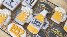 decorated cookies with frosting and beer on a cooling rack for someone's 30th birthday