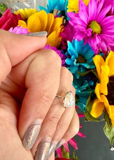 🌟 Welcome to Shine Bright Crystals! 🌟 📏 Size: 7.75 Embrace the mystical charm of our Sterling Silver Moonstone Ring, size 7.75. This beautifully handcrafted piece captures the essence of the moon's magic, featuring a captivating moonstone that radiates with an ethereal glow. Perfect for those who are drawn to the enchantment of the lunar cycle. 🌙 Mystical Elegance: The moonstone's ethereal beauty is perfectly complemented by the timeless sterling silver setting, creating a piece that's as captivating as the night sky. Artisan Craftsmanship: Expertly handcrafted, each ring is a unique testament to the artisan's skill, ensuring no two pieces are exactly alike. Lunar Inspiration: Inspired by the magic of the moon, this ring is a perfect accessory for those who feel a connection to the cel Magical Crystal Ring Gift, Magical Sterling Silver Crystal Ring For Gift, Magical Adjustable Silver Crystal Ring, Adjustable Silver Mystical Crystal Ring, Adjustable Silver Magical Style Rings, Healing Moonstone Ring With Natural Stones, Moonstone Stackable Rings For Gift, Adjustable Moonstone Rings With Natural Stones, Spiritual Moonstone Crystal Ring