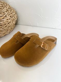 Effortlessly slip into style with our Kalina Clogs in a beautiful tan color. These clogs feature a sleek buckle detail and are designed for easy slip on wear. Step into comfort and fashion with these must-have clogs! Affordable Brown Clogs With Buckle Closure, Cheap Brown Clogs With Buckle Closure, Wooden Shoe, Wooden Shoes, Womens Clogs, Tan Color, Fashion Women, High Heel, Clogs