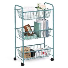 "Buy the NEX™ Blue Large 3-Tier Rolling Basket Stand with Shelves & Wheels at Michaels. com. The three tier rolling basket stand is an ideal item to have around the house and is versatile enough to be used in many different ways and in different areas around the house. The three tier rolling basket stand is an ideal item to have around the house and is versatile enough to be used in many different ways and in different areas around the house. It is perfect to be used in the bathroom as storage f Farmhouse Blanket Ladder, Hanging Storage Shelves, Farmhouse Blankets, Wall Mounted Spice Rack, Basket Stand, Organization Cart, Kitchen Spice Racks, Quilt Rack, Spice Rack Organiser