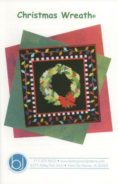 a christmas wreath is on the front cover of a quilter's pattern book