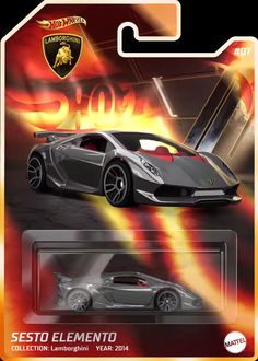 a toy car with flames on the back and front wheels, is in its package