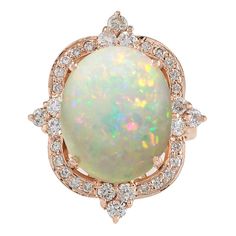 Stamped: 14K Rose Gold Total Ring Weight: 11.2 Grams Total Natural Opal Weight is 10.80 Carat (Measures: 16.00x12.00 mm) Color: Multicolor Total Natural Diamond Weight is 0.80 Carat Color: F-G, Clarity: VS2-SI1 Face Measures: 26.05x21.85 mm Sku: [702214W] Opal Eyes, Sapphire Cocktail Ring, Opal Diamond Ring, Mom Ring, Gold Luxury, Rose Gold Diamond Ring, Diamond Cocktail Rings, Gold Diamond Ring, La Face