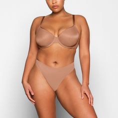 Meet your lightest, most breathable demi bra. This innovative, ultra-airy silhouette has a comfortable and supportive underwire and breathable lined cups that feel like you have nothing on. Features fully adjustable straps, smoothing microfiber wings, SKIMS hardware logo on front wing, and hook and eye back closure. Fits true to size. Comple te your set with our selection of panties at special bundle pricing. Mesh Bra, Cotton Bras, Bandeau Bra, Full Coverage Bra, Triangle Bralette, Racerback Bra, Innovative Fashion, Black Bralette, Demi Bra