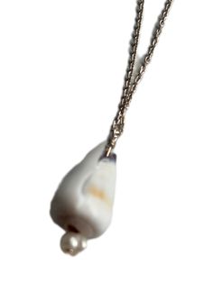 Each necklace has a Hawaiian cone shell on a 20" sterling silver chain. Each shell is approximately 2cm high. Designed and created in Hawaiʻi. ***SALE ON THIS ITEM IS FINAL - NO RETURNS ACCEPTED FOR THIS ITEM**** Cone Shell Necklace 1 with Swarvoski Crystal Cone Shell Necklace 2 with freshwater pearl Cone Shell Necklace 3 sterling silver bead Cone Shell Necklace 4 sterling silver bead Cone Shell, Global Village, Shell Necklace, Silver Bead, Shell Necklaces, Sterling Silver Bead, Sterling Silver Chain, Sterling Silver Chains, Freshwater Pearls