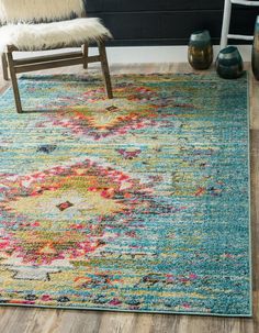 an area rug with colorful flowers on it