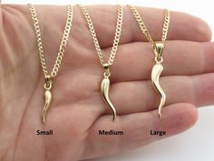 "Fabulous 14k Solid Yellow Gold Italian Horn Necklace Material: 14k Gold , Stamped on the horn and the chain Available size: Small , Medium , Large Small size = 3/4\" long not including the bail by 4 mm wide Medium size = 1\" long not including the bail by 5 mm wide Large size = 1 1/4\" long not including the bail by 6 mm wide Available lengths: 16\" , 18\", 20\", 24\" Cuban chain , 2.6 mm wide Length and avg weight: Small: 16\"= 5.3 grams , 18\"= 5.8 grams, 20\"= 6.1 grams, 24\"= 7.3 grams Medi Italian Horn Necklace, Italian Horn, Horn Necklace, The Horn, Cuban Chain, Solid Yellow, Medium Size, Charm Necklace, Large Size