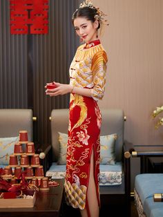 Looking for a traditional Chinese dress for your big day? This contemporary two-pieces qipao ensemble includes a sleeveless qipao/cheongsam dress and a matching jacket top. The dress features exquisite traditional Chinese phoenix, peony, and cloud embroideries, making it the ideal attire for your traditional Chinese wedding and tea ceremony. Size Guide: Please refer to the size guide picture before placing the order. Please leave your Height, Weight and Bust/Waist/Hip measurements in the Persona Traditional Formal Dress With Stand Collar, Festive Cheongsam For Traditional Ceremonies, Traditional Cheongsam For Ceremony, Traditional Summer Wedding Cheongsam, Luxury Long Sleeve Traditional Cheongsam, Wedding Qipao, Birds Embroidered Qipao Dress, Traditional Fitted Floral Print Cheongsam, Red Qipao