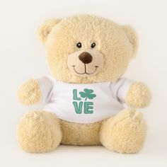 a teddy bear wearing a birthday shirt with the word jacob on it's chest