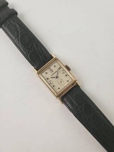 Art Deco Longines vintage watch. 14K solid yellow gold case, 36mm long from lug tip to lug tip. Genuine 5 diamond dial - 1 diamond at 3,1 diamond at 9, 3 diamonds at 12. Longines manual wind movement. Clean and classic Longines dress watch serviced and ready to wear. Vintage Rectangular Diamond Watch With Diamond Hour Markers, Vintage Diamond Watch With Rectangular Dial, Antique Diamond Watch With Diamond Hour Markers, Vintage Rectangular Jewelry With Diamond Hour Markers, Vintage Diamond Watch With Rectangular Dial For Formal Events, Vintage Diamond Watch With Rectangular Dial For Formal Occasions, Vintage Yellow Gold Watches With Diamond Hour Markers, Classic Gold Diamond Watch With Single Cut Diamonds, Vintage Watches With Diamond Hour Markers