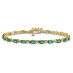 14k yellow gold and 14k white gold diamond and 4.62 cttw emerald bracelet. Measures approximately 3/16 of an inch in width and has a box catch closure. Classic Emerald Tennis Bracelet In Yellow Gold, Classic Gold Tennis Bracelet With Emeralds, Fine Emerald Tennis Bracelet In Yellow Gold, Fine Jewelry Green Diamond Bracelet In 14k Gold, Fine Jewelry Emerald Tennis Bracelet In Yellow Gold, Classic Emerald Jubilee Bracelet, Classic Yellow Gold Emerald Tennis Bracelet, Classic Luxury Diamond Bracelet With Emerald, Luxury Yellow Gold Emerald Bracelet