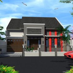 a red car is parked in front of a two story house with a white fence