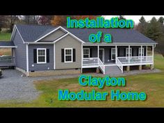 a house with the words installation of a clayton modular home