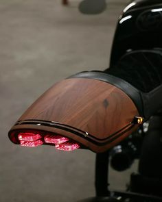 a close up of a motorcycle's tail light