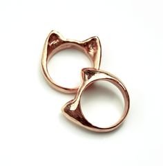 "This adorable Cat Ring is handcarved and made of solid 14kt Rose Gold. Great conversation starter. You can wear this ring facing either direction. Wear two cats rings at a time to get a layered look. Named after the Cure song \"Love Cats\" this ring can't help but keep you smiling throughout the day. Hand carved out of wax, this ring has subtle realistic details of fur markings around the ears. RING MEASUREMENTS: 3/4\" wide from ear to ear (0.01905 meters) 1/4\" tall, ear height (0.00635 meters Gold Cat Ring, Mercy For Animals, Animal Ring, Two Cats, Ear Ring, Cat Ring, Animal Rings, Cat Ear, Snake Ring