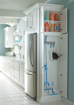 the kitchen is clean and ready for us to use it's cleaning supplies in