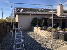 a house with a metal fence around it