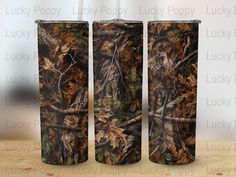 thermos are designed to look like realtree camo with leaves on them