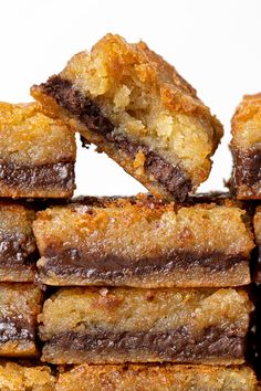 a stack of brownie squares sitting on top of each other