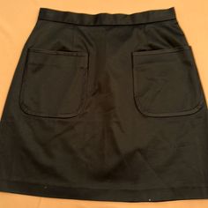 Elizabeth And James. Black Mini Skirt. Back Zipper. Side S. Excellent Condition. Never Worn. Black Stretch Skirt With Pockets, Black Skirted Skort With Pockets, Black Relaxed Skort With Pockets, Retro High Waisted Black Mini Skirt, Retro High Waist Black Mini Skirt, Retro High-waisted Black Mini Skirt, Black Skirt With Side Pockets, Fitted Black Skirt With Side Pockets, Retro Black Mini Skirt