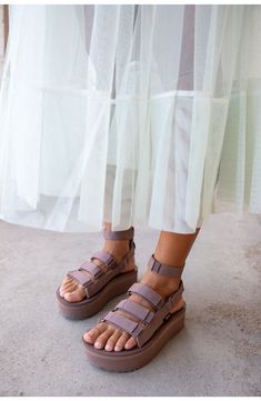 This sporty gladiator sandal revamp is boosted by a chunky platform sole, hook-and-loop closures and a removable ankle strap for added versatility. 1 3/4" platform Textile and leather upper and lining/rubber sole Imported Teva Mevia Flatform Outfit, Uggs Sandals Outfit, Cute Comfy Sandals, Summer Sandals 2024, Sandals 2024 Trends, Platform Tevas, Platform Teva, Sandals For Dress, Platform Sandal Outfit