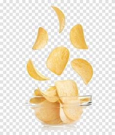 potato chips falling into a glass bowl on top of a white table transparent background png