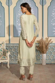 Creamy off-white tissue Banarasi kurta with floral woven motifs and silver zari work highlights. Comes with Banarasi dupatta and pant. - Aza Fashions Elegant Pista Green Churidar With Straight Kurta, Elegant Pista Green Churidar With Chikankari Embroidery, Elegant Pista Green Chanderi Churidar, Elegant Pista Green Churidar With Resham Embroidery, Elegant Unstitched Pista Green Suit With Cutdana, Elegant Pista Green Unstitched Suit With Cutdana, Elegant Traditional Wear In Pista Green With Self Design, Elegant Pista Green Silk Churidar, Elegant Pista Green Traditional Wear With Self Design