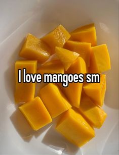 i love mangoes sm on a white plate with the words, i love mangoes sm