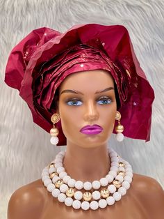 Get ready to make a statement with the African Traditional Hat Gele, a must-have accessory for any fashion-forward individual. Handmade with care, this pre-tied and ready-to-wear hat is available in multiple colors to match any outfit.  Whether you're attending a wedding, as the bride, bridesmaid, mother of the bride, or simply as a guest, this hat will add an extra touch of elegance and style to your look.  So why wait? Add some African flair to your wardrobe today with the African Traditional Hat Gele! Elegant White Headwrap One Size Fits Most, Elegant Adjustable Turban, Adjustable Elegant Turban, Adjustable Trendy Bonnet One Size, Elegant Summer Headwrap Hat, Elegant Adjustable Red Turban, Elegant White Summer Turban, Adjustable Headwrap For Party, Elegant Beach Headwrap