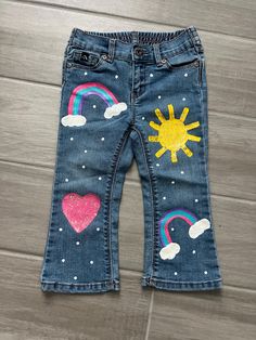 Rainbows and Sparkles! Oh my! Outfit your sweetie in these fun Size 24M up-cycled painted denim (Jordache). Please reach out for custom painted denim and additional sizing. Cleaning instructions: spot clean, do not submerged in water Cute Denim Jeans For Playtime, Painted Denim Jeans, Jeans Painting, Cooking Dishes, Painted Jeans, Fun Size, Painted Denim, Painted Clothes, My Outfit