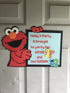 a sesame street sign hanging on the front door of a house that says today's party is brought to you by the letter t and the number